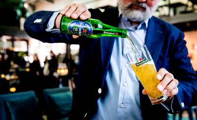 Warm voorjaarsweer stuwt verkoop Heineken
