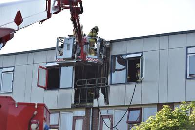 Gewonde bij brand in flatwoning Ede, twee woningen tijdelijk onbewoonbaar