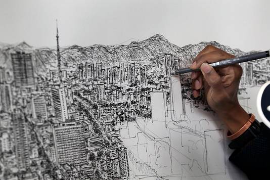 Autistische artiest kan stad na één blik perfect natekenen | Cultuur | AD.nl